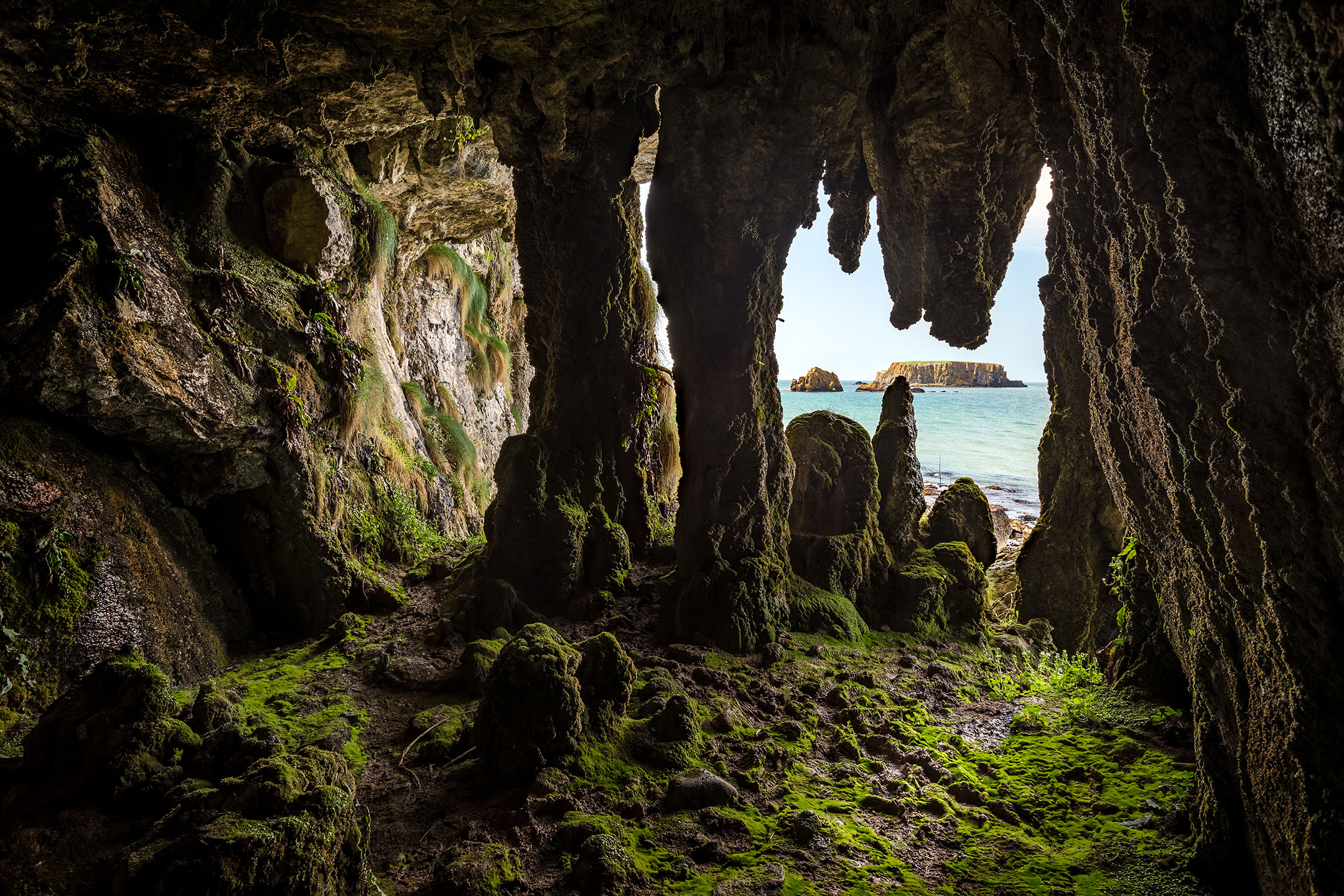 Looking out of the Larrybane Cave to Sheep Island, County Antrim, Northern Ireland
